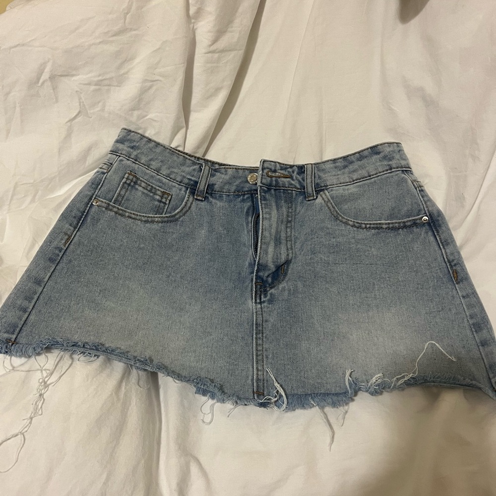 Mini blue denim skirt